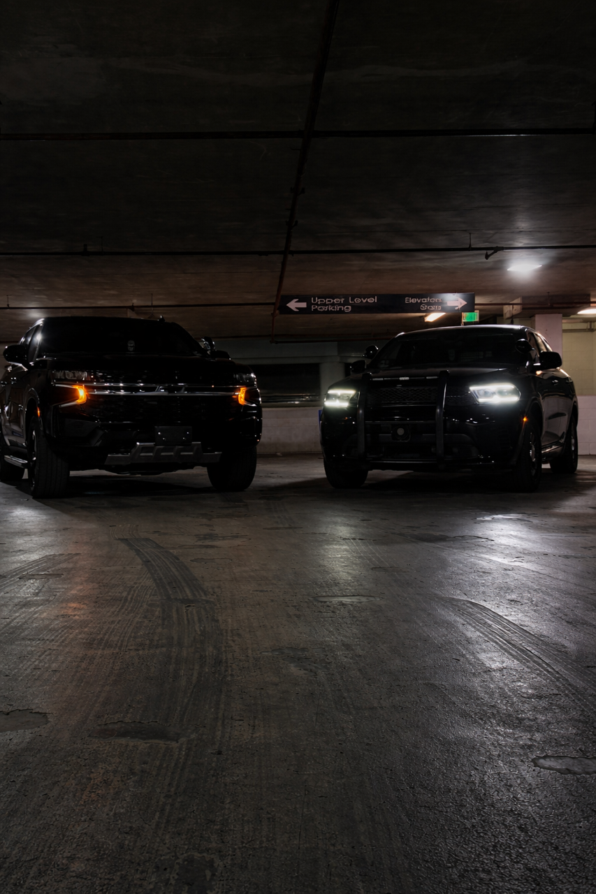 Modway Protection patrol vehicles staged in a parking structure