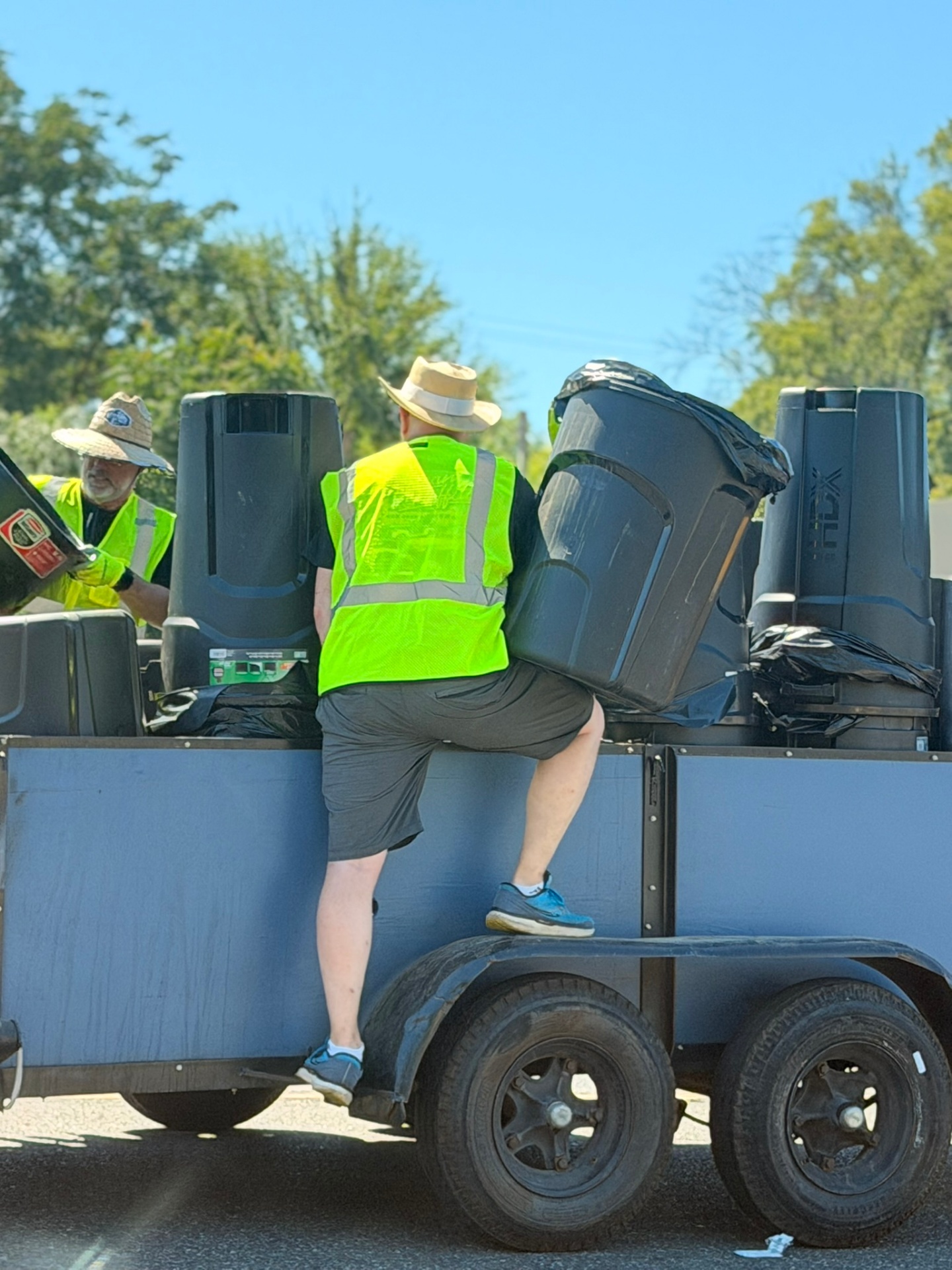 Volunteers loading cleanup crew supplies